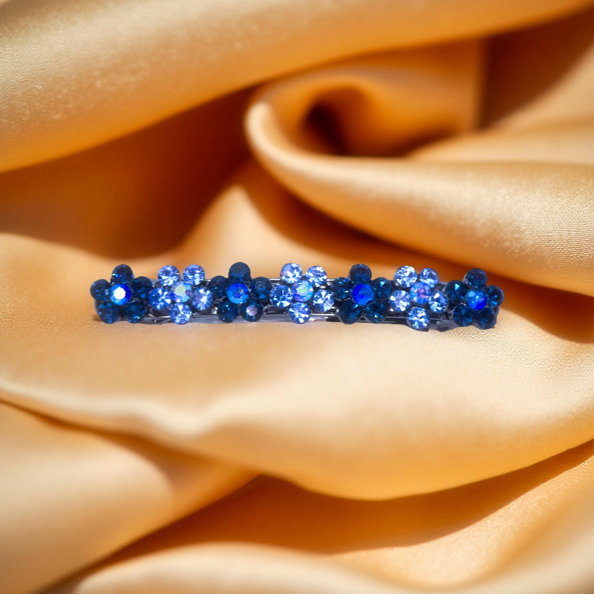 FloraDot Row hair accessory, Multi Blue color option, product view.