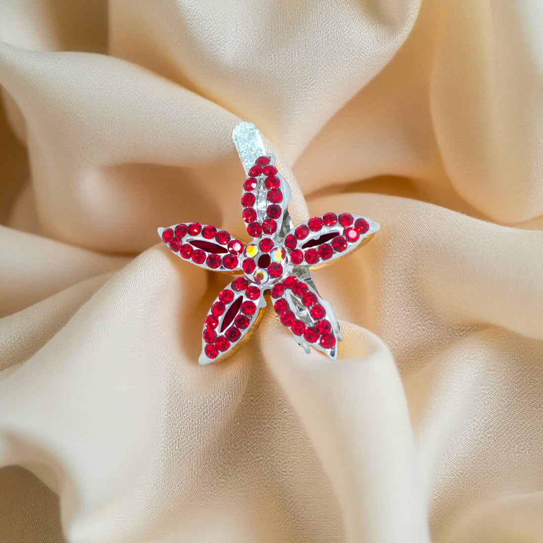 Haerime LilyGleam Clip in Red – vibrant ruby floral clip captured from top to highlight rich color and detail