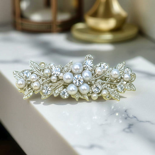 Haerime Lumielle Frost Barrette in Pearl – front view of silver floral barrette with pearl blossoms on soft white surface
