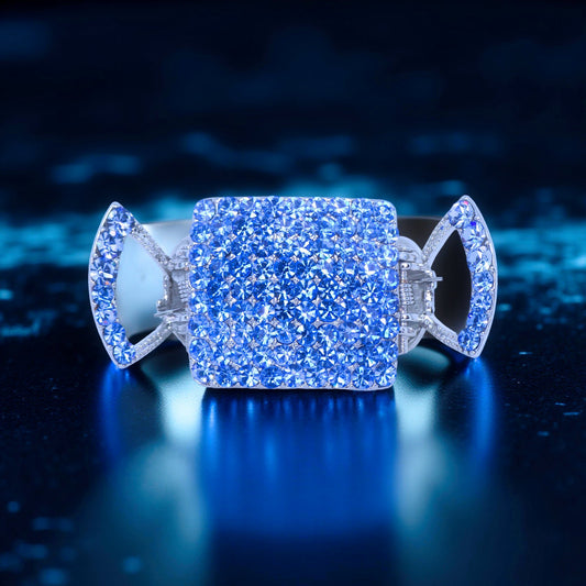 Haerime Lunette Square Claw in Blue – crystal pavé mini jaw clip with open side wings, shown on high-gloss black surface under dramatic lighting