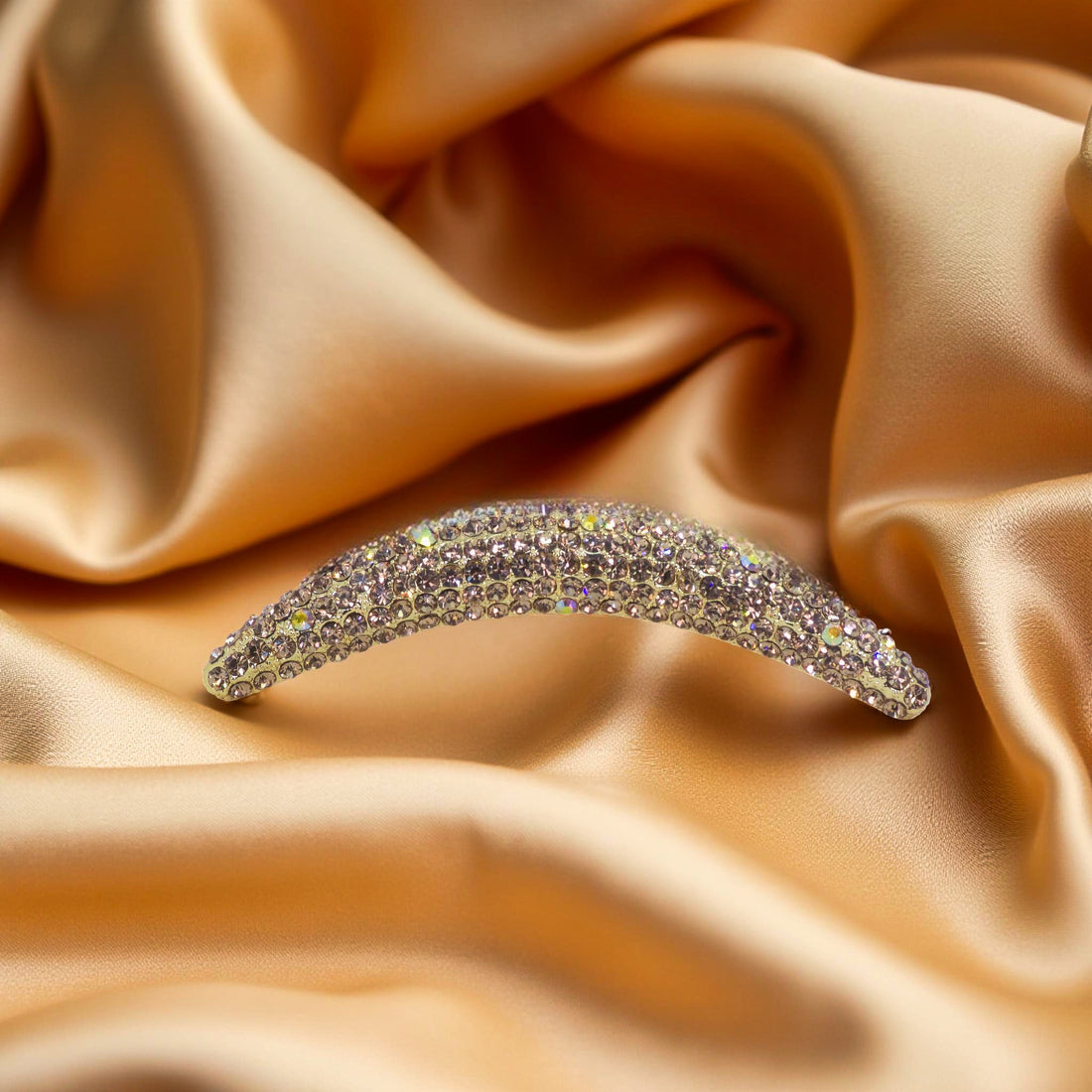 Haerime Lunoria Arch Comb in Amber – flat view of golden-tone comb with honey crystal bloom effect