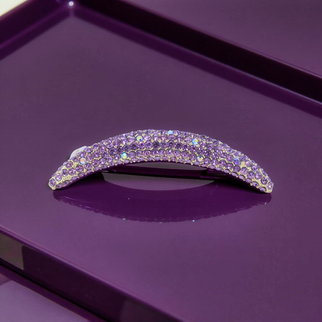 Haerime Lunoria Arch Comb in Purple – angled close-up showing layered purple pavé and thin metal edge