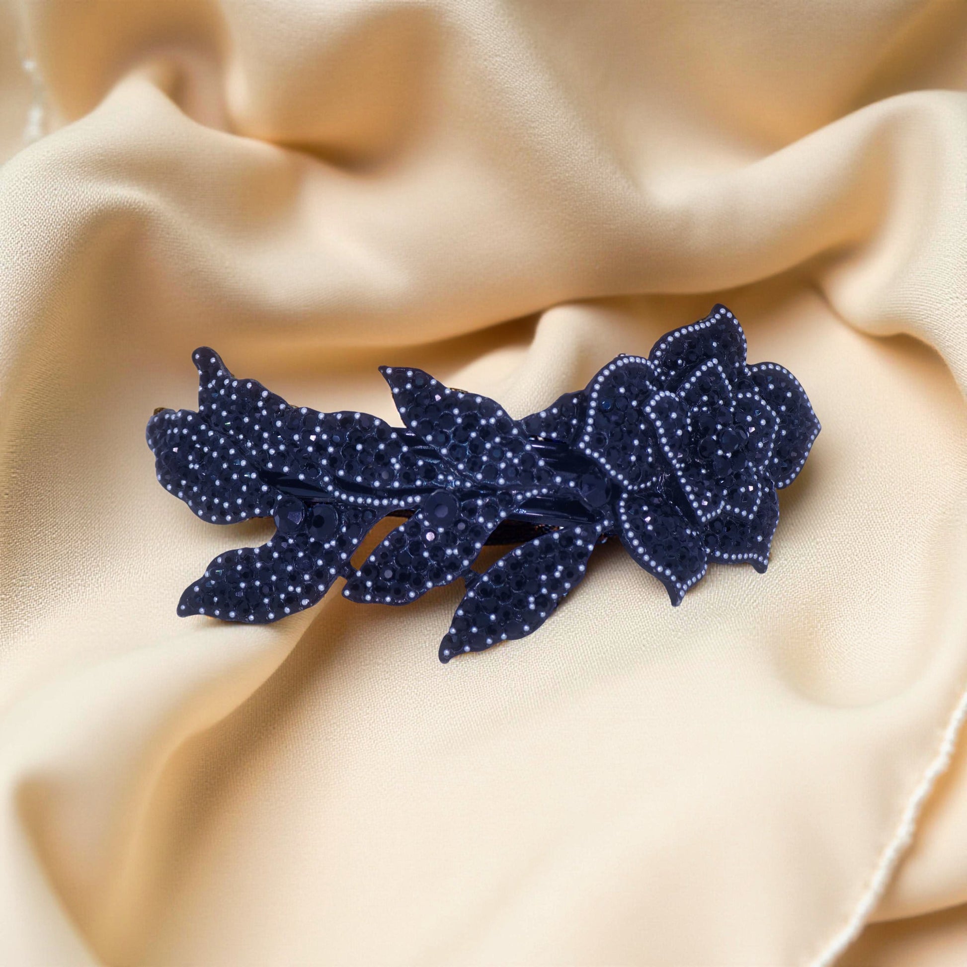 Haerime Midnight Bloom Barrette in Jet Black – rich matte floral crystal arc in solid black tones on dark velvet pouch