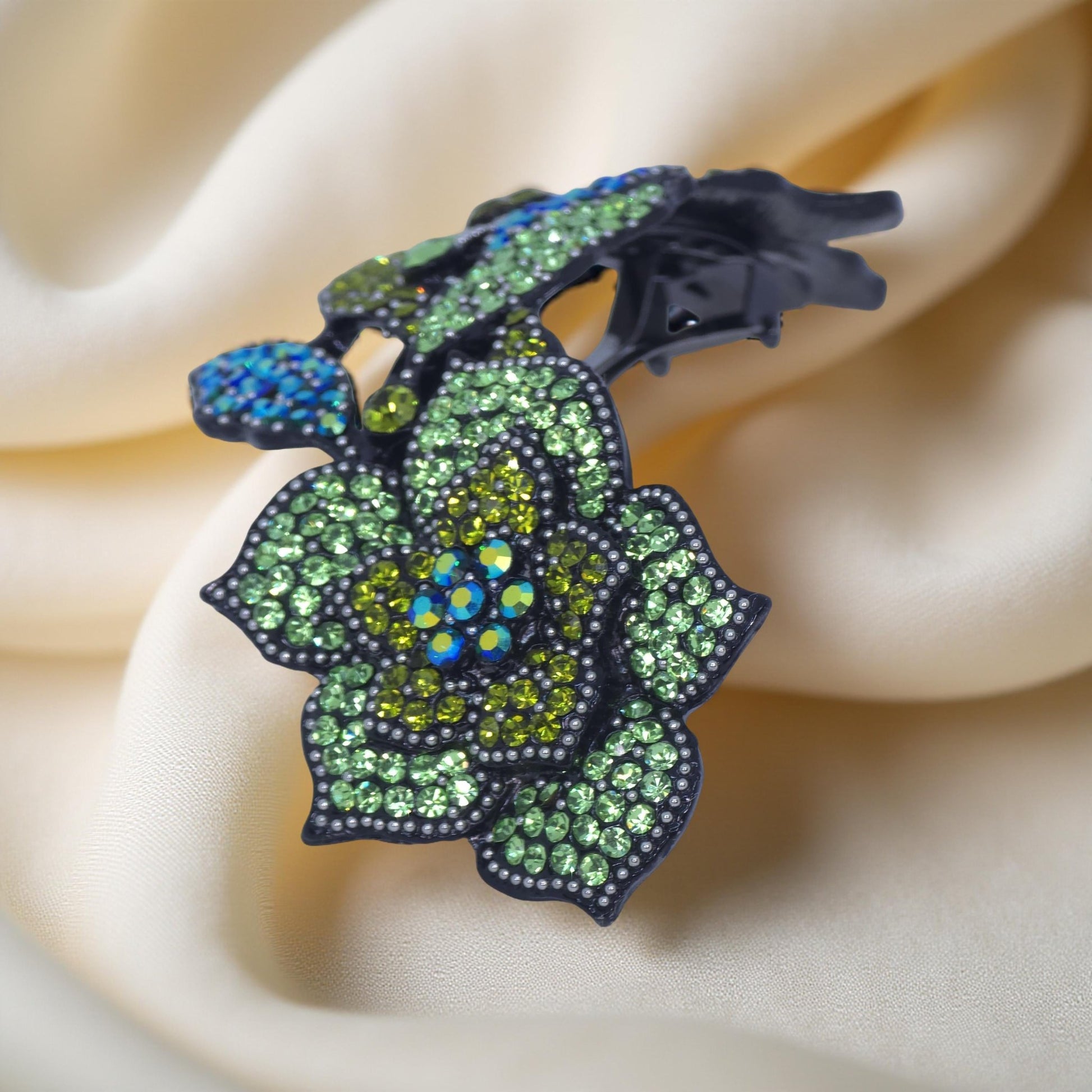 Haerime Midnight Bloom Barrette in Mint – side view showing arched silhouette and layered bloom motif, reflecting soft shimmer