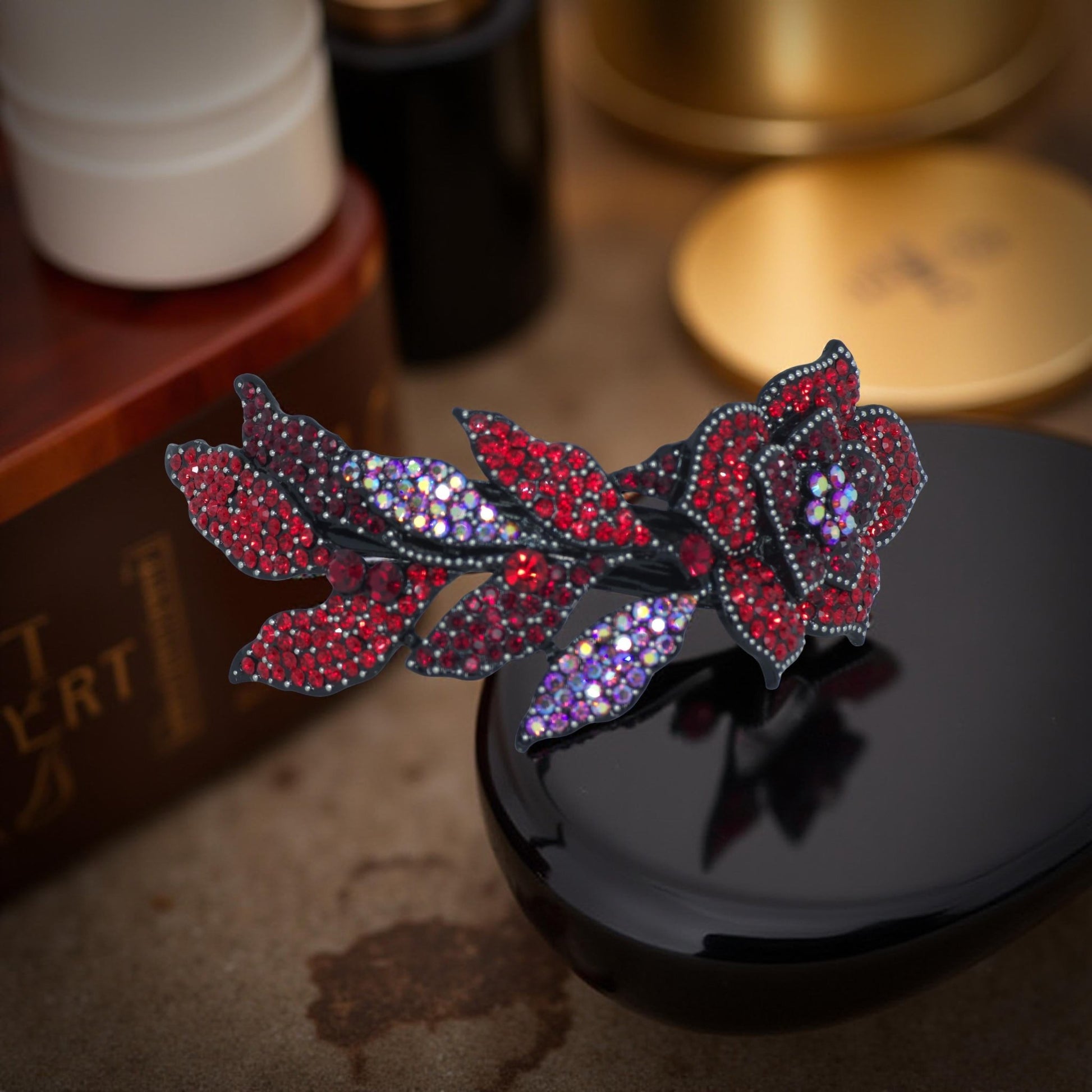 Haerime Midnight Bloom Barrette in Red – close-up capturing crimson pavé crystals layered in open floral motif