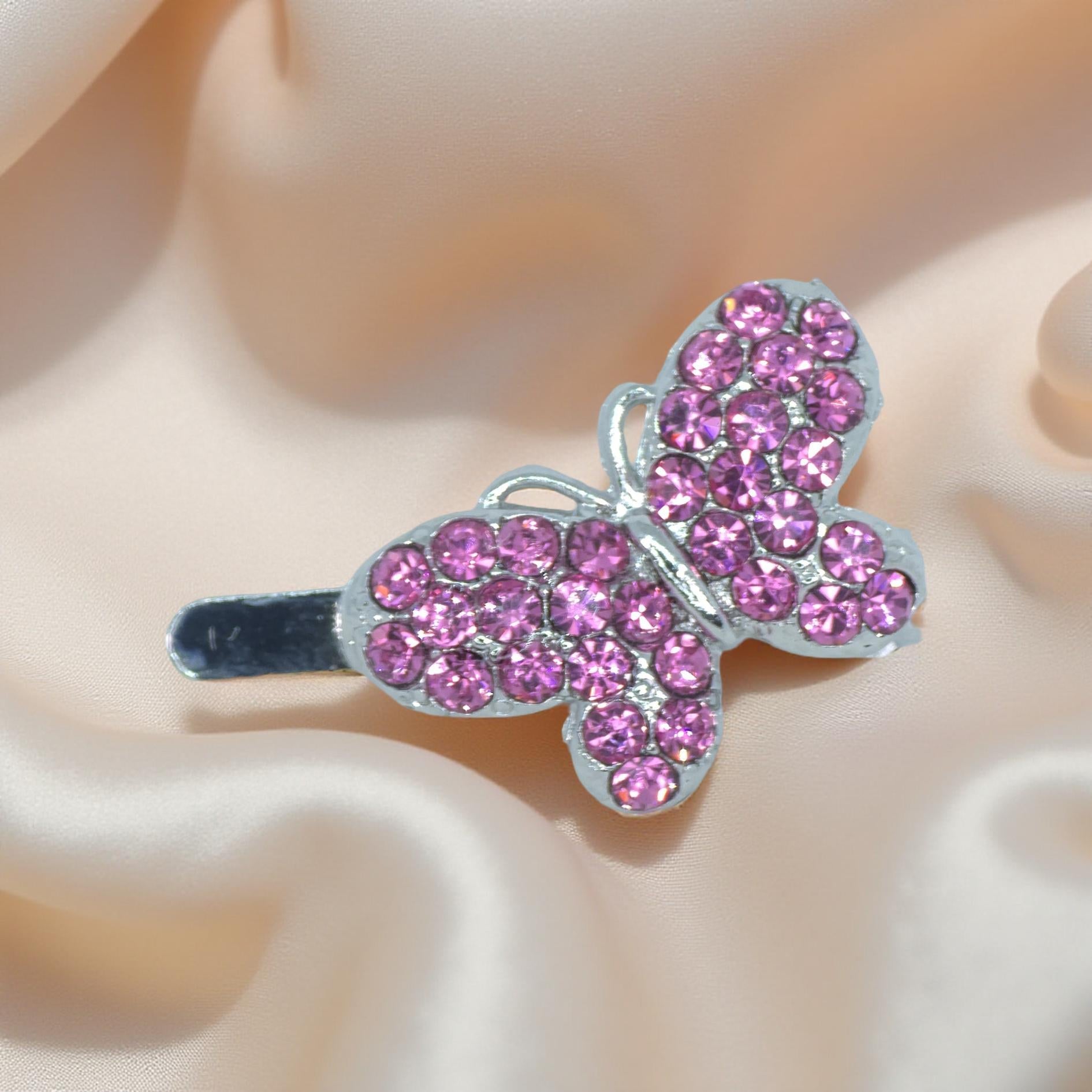 Haerime Papillon Éclat Clip in Pink – close-up of radiant pink pavé set into rounded butterfly form