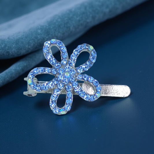 Haerime PetalMuse Magnetique in Blue – navy crystal bloom clip shown on dark blue silk backdrop under soft ambient lighting