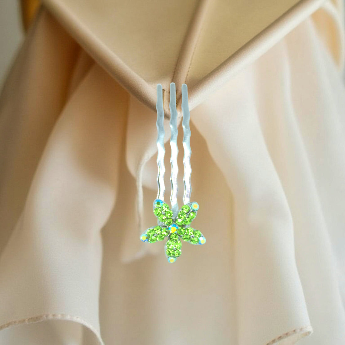 Haerime Starpetal Minis in Peridot – close-up showing yellow-green five-petal pavé and curved comb base under ambient glow