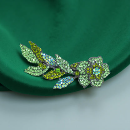 Twilight Bloom Mini hair accessory, Peridot color option, product view.